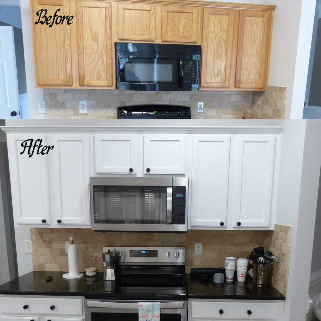 Homeowner opted to refinish their kitchen in an extra white semi-gloss, upgrading appliances to stainless steel, and changed out to black knobs