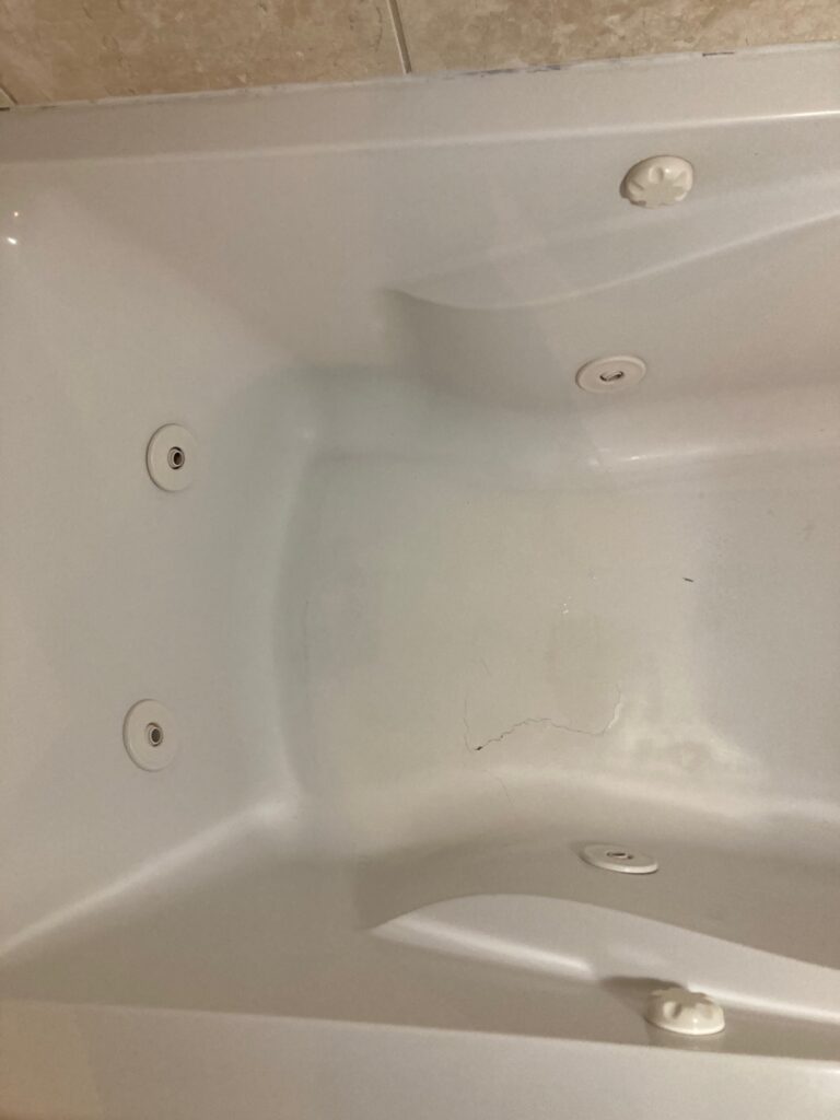 Crack at bottom of tub - in need of repair