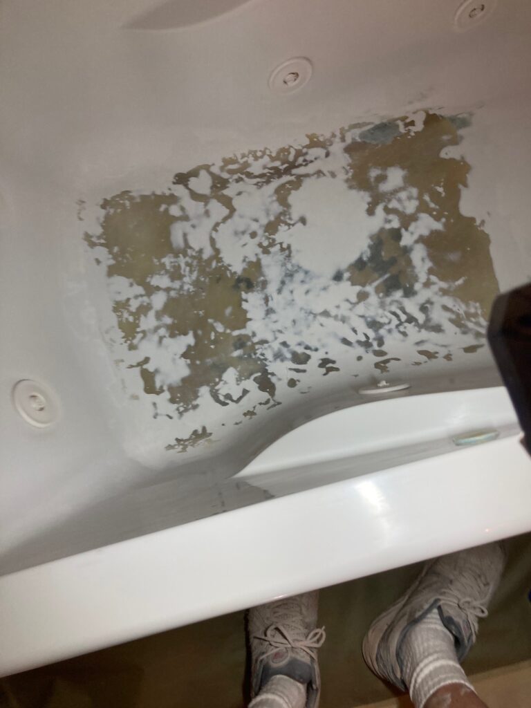 Crack at bottom of tub - repair, then re-glaze