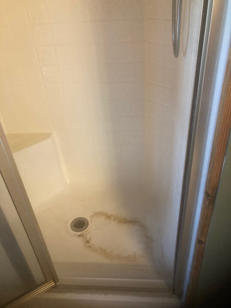 Stained shower base in need of a fresh touch