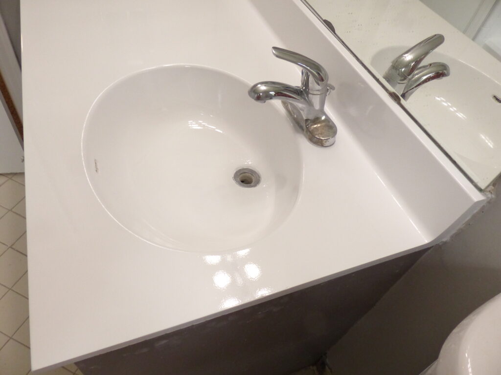 Basin after a solid white gloss Urethane resurface (AFTER)