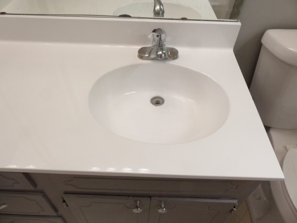 Basin after a solid white gloss Urethane resurface (AFTER)
