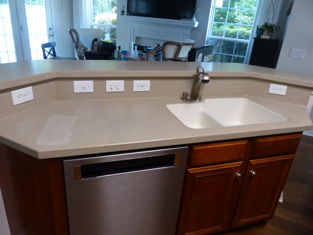 This homeowner wanted his Corian countertop a little lighter, but didn't want to completely replace  (BEFORE)