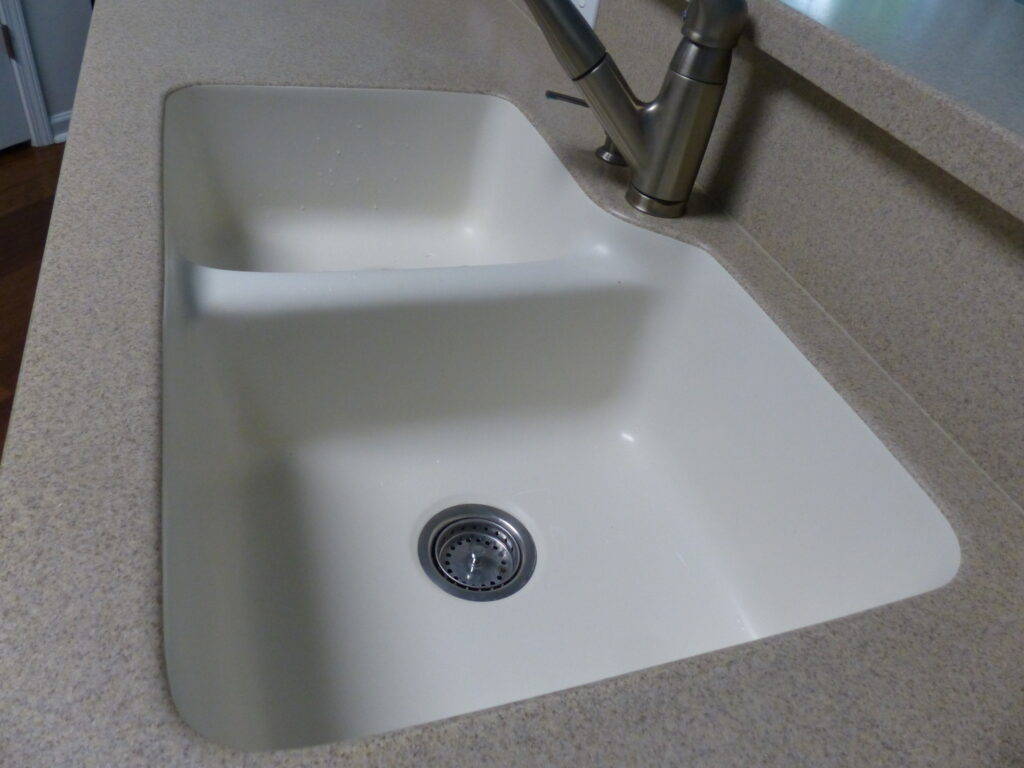 Sink had some stains, and the homeowner wanted a fresh look for his sink (BEFORE)