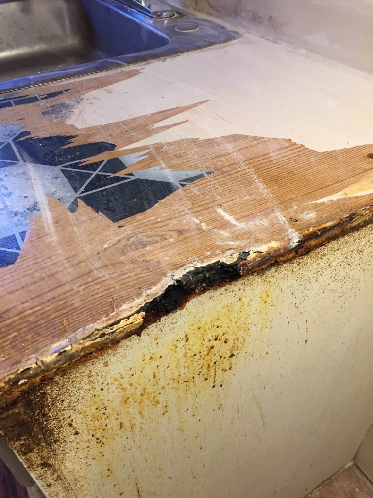 Countertop edge burnt, damaged - in need of repair